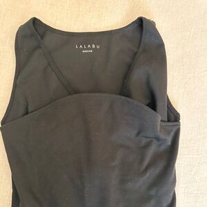 Women’s baby wearing tank top. Size medium